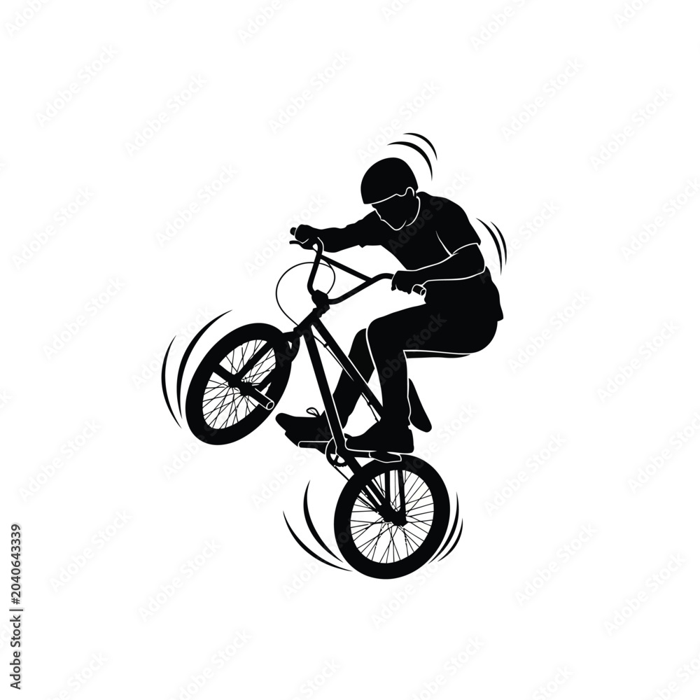 Naklejka premium Man performing trick on bmx bike in motion