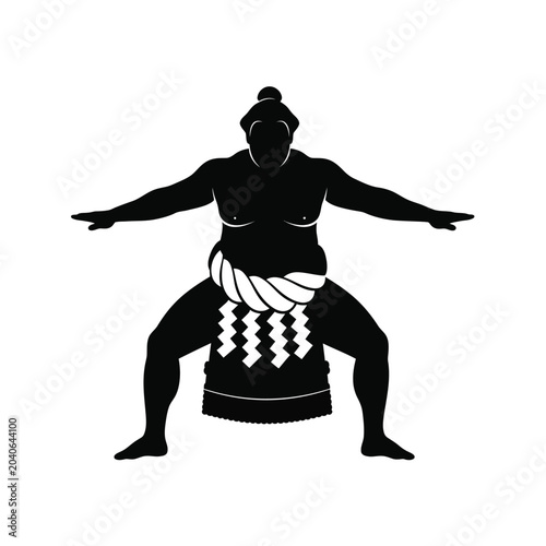 man in traditional outfit dancing with arms outstretched. Sumo