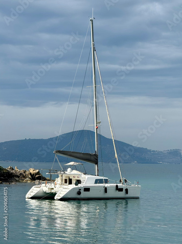 Beautiful view on catamaran in Güllük village, Bodrum, Turkey
