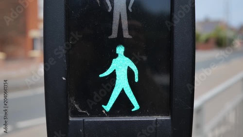 UK road crossing. Green man. Go 