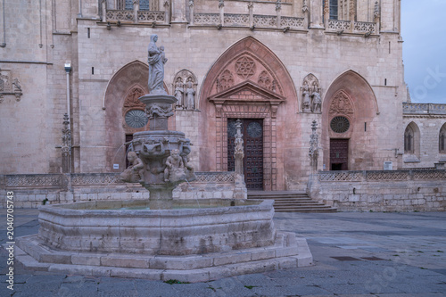 Historic Burgos Cathedral Facade With Ornate Stone Fountain And Gothic Architecture In Spain