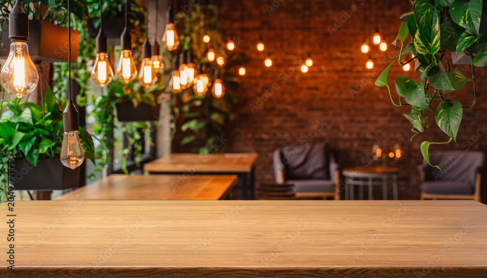 Obraz premium Trendy Co-working Space Interior Warm Amber Edison Lights Bokeh Backgr