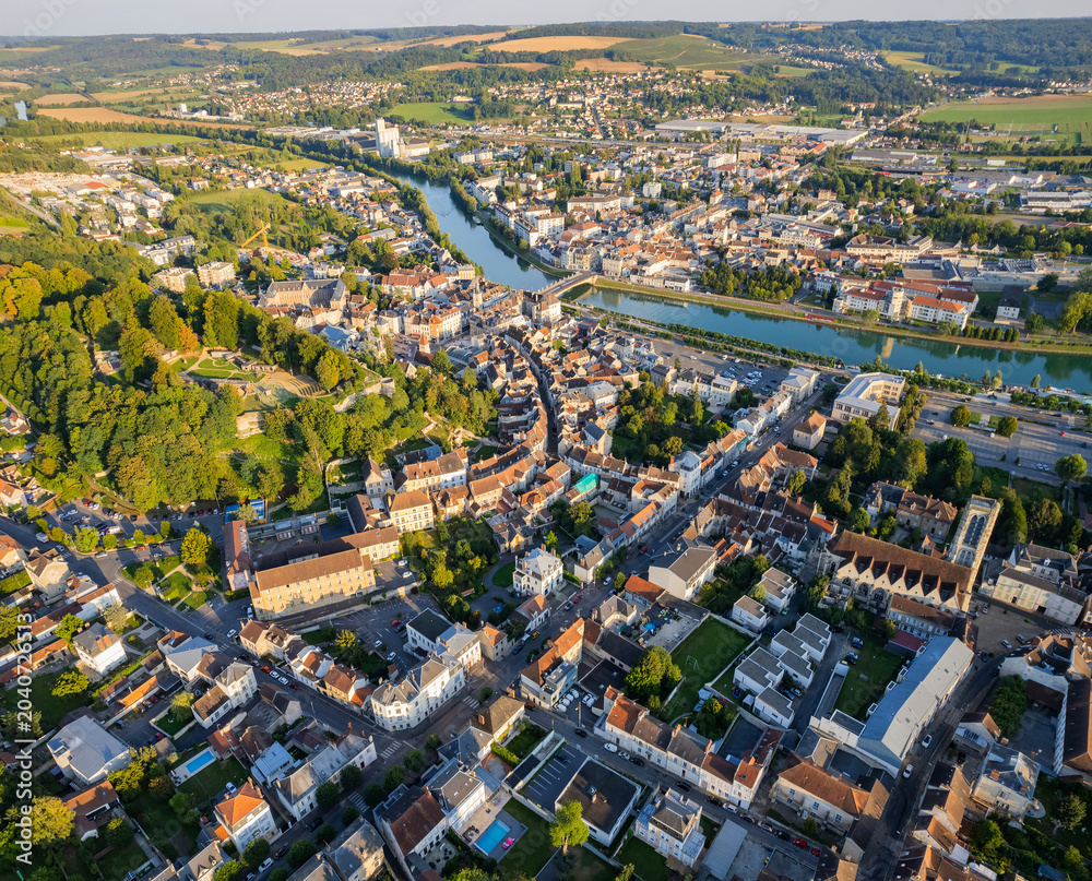 Fototapeta premium Aerial panoramic view above the old town around the city Château-Thierry in France on a sunny summer day. 