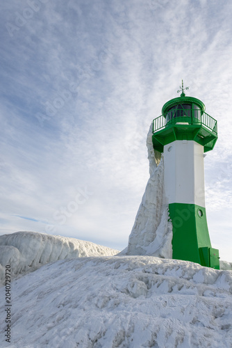 Sassnitz Lighthouse in winter with snow