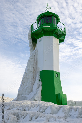 Sassnitz Lighthouse in winter with snow