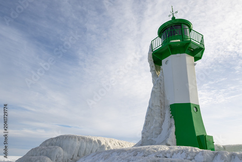 Sassnitz Lighthouse in winter with snow