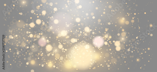 Photos Golden glitter confetti and soft blurred bokeh lights exploding on grey transpar