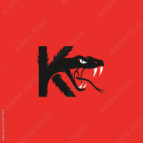 Valokuva Bold black letter 'K' featuring a roaring black panther head on a red background