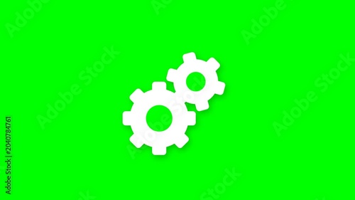 Two flat white interlocked gears rotating on a vibrant green screen an isolated graphic resource animation