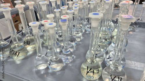 volumetric flasks in a lab.
