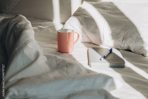 Morning Coffee and Journal on Bed in Soft Natural Light, Morning routine