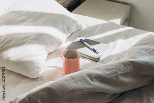 Morning Coffee and Journal on Bed in Soft Natural Light, Morning routine