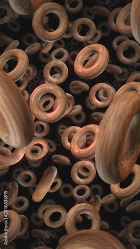 A background of spinning 3D carved wooden style shapes on an endless loop.

