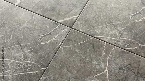 Canvastavla Charcoal grey marble tile texture background with white veins and diagonal cross
