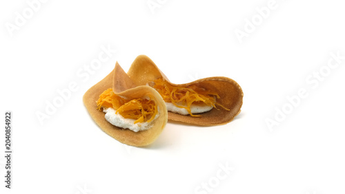 Traditional Thai crepes primarily consist of rice flour and coconut milk seasoned only with salt.