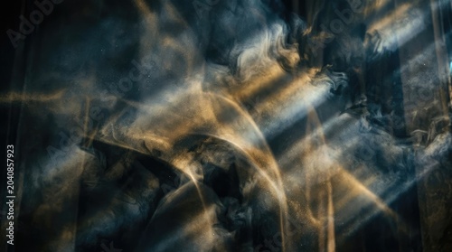 Golden light streams through a dark, misty space, illuminating a dragon's silhouette. The dragon's form is partially obscured by swirling smoke and dust, creating a dramatic and ethereal effect.