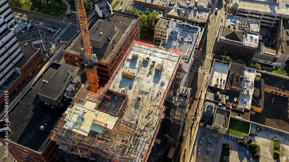 Fototapeta premium Aerial view of construction at the HELIX redevelopment project in downtown New Brunswick New Jersey