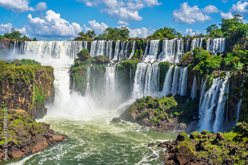 Panoramic view of the majestic Iguazu Falls in Iguazu National Park featuring powerful cascading water