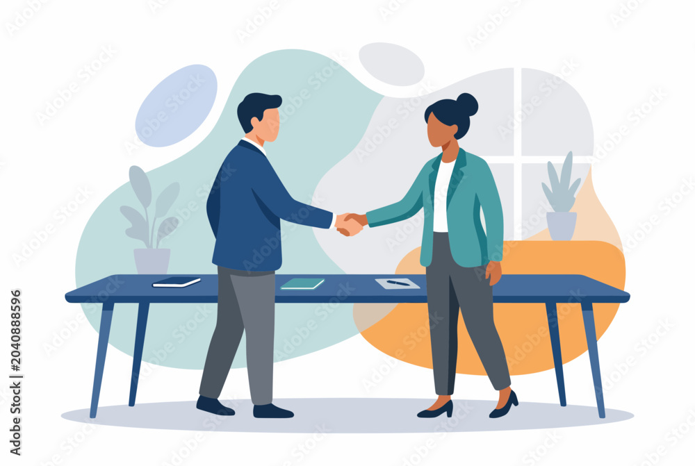 Obraz premium Business partners shaking hands to seal a deal in the office