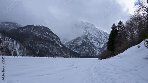 A winter of magic and mystery. Lake Predil in winter. Tarvisio.