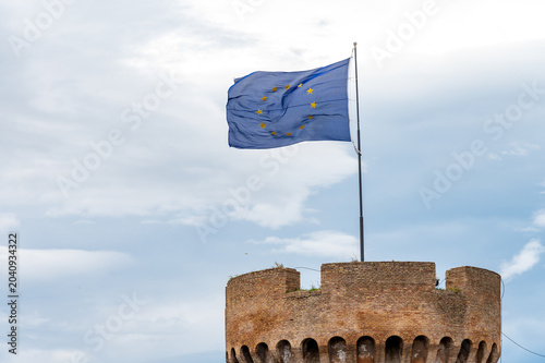 фотографія European Union flag EU blue flag with circle of twelve golden stars symbolizing unity and solidarity among EU member states