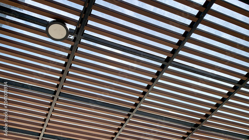 Cuadro en lienzo Modern wooden louver ceiling with metal frame and downlight