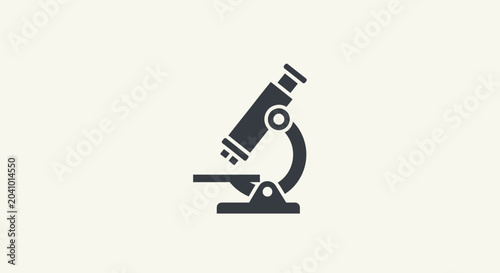 Foto Black microscope on a table.