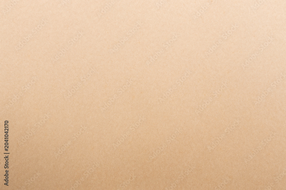 Fototapeta premium Natural brown kraft paper texture. Brown cardboard texture. Recycled kraft paper surface