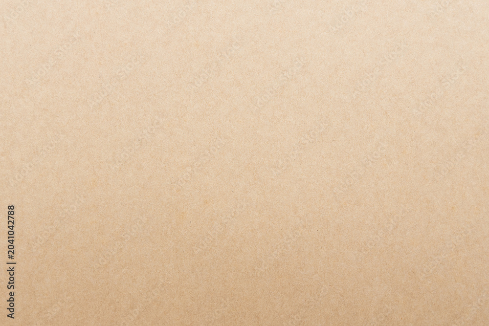 Fototapeta premium Natural brown kraft paper texture. Brown cardboard texture. Recycled kraft paper surface