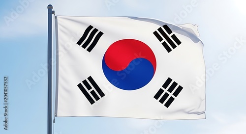 South Korean National Flag Waving on Flagpole Against Blue Sky