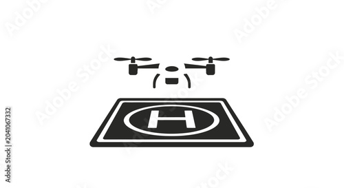 Foto Drone hovers over helipad landing site.