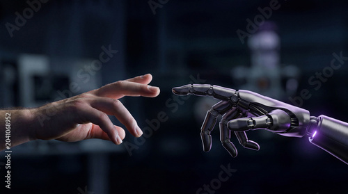 Bild auf Leinwand Human Hand And Robotic Hand Reaching Out To Touch In A Symbolic Gesture Of