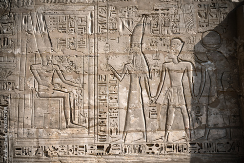 Photos Close up details of ancient Egyptian history shown in reliefs and hieroglyphs inside Medinat Habu, the ancient Egyptian Mortuary Temple of Ramesses III on the West Bank of The Nile, Luxor, Egypt