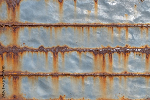 A close up of a rusted metal surface. 