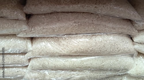 rice in transparent bags, packaging on the shelf in the supermarket. Grocery. trade