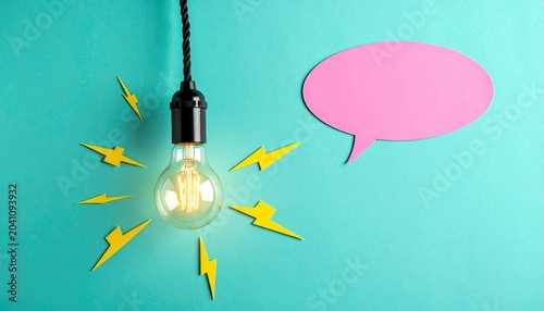 Glowing Light Bulb with Speech Bubble Representing Creativity and Communication