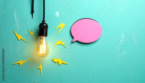 Glowing Light Bulb with Speech Bubble Representing Creativity and Communication