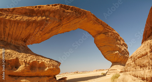Rainbow Arch rock formation in desert landscape. Al Ula, Saudi Arabia