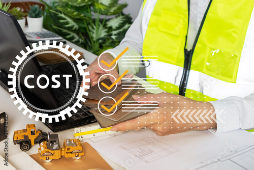 Tableau sur toile Construction engineers oversee construction sites, manage labor and materials, and budget