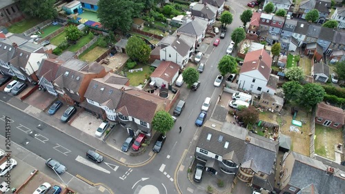 Aerial View of British City During Mostly Cloudy Day. Urban Drone Flight Above Streets of British City and Town of England Great Britain. Drone Mounted Camera Footage Was Captured From Medium Altitude
