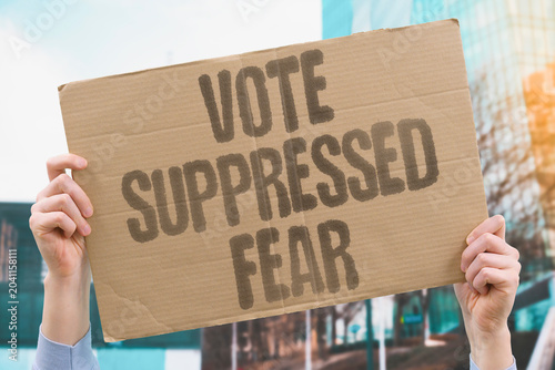 Photos "Vote suppressed fear" Intimidation prevents citizens from voting