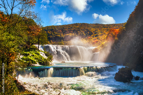 Strbacki Buk waterfall on the Una River in Bosnia and Herzegovina in autumn. Long exposure.