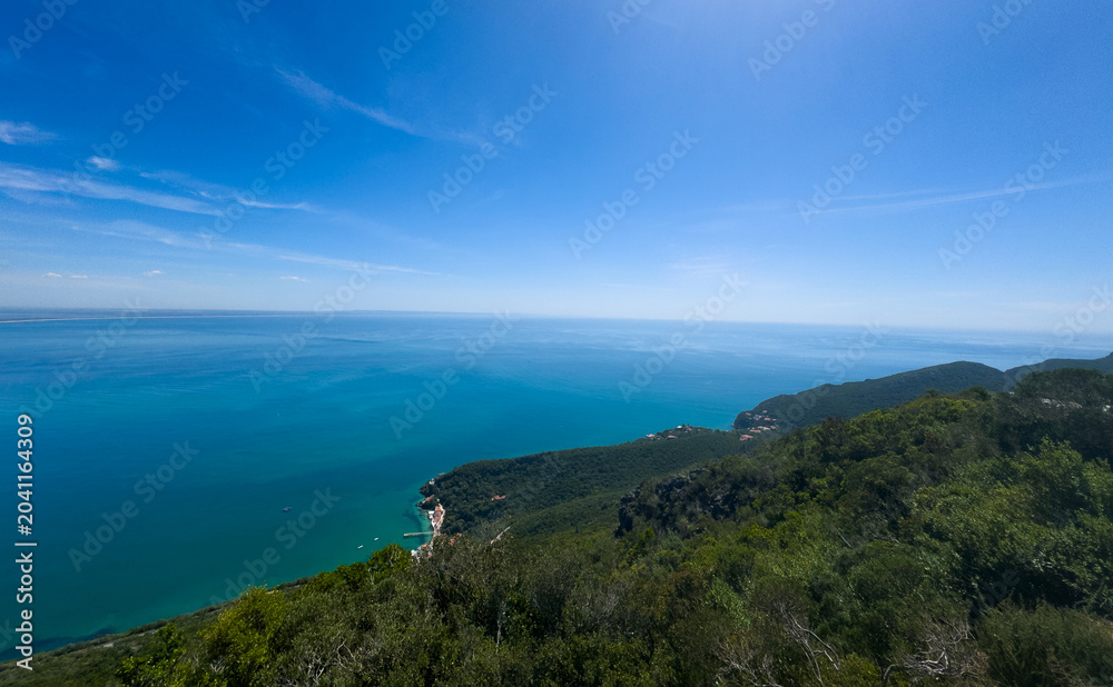 Fototapeta premium Panoramic aerial view of Arrabida beach. Rocky seascape. Creiro beach. Setubal region, Atlantic Ocean, Portugal