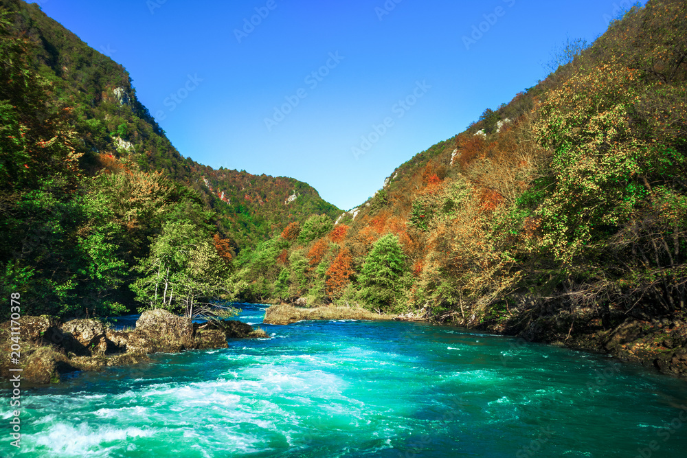 Fototapeta premium Beautiful turquoise Una River in Bosnia and Herzegovina in autumn
