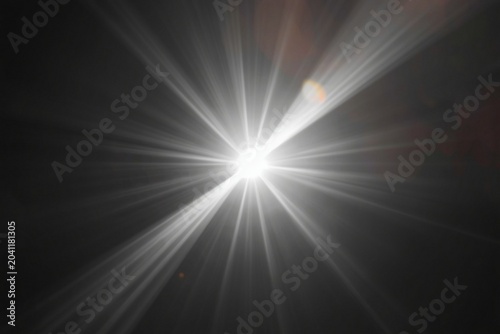 A glowing white light flare Photoshop overlay effect. A realistic, bright light ray soft gradient on a transparent background high-quality effect, photo and videos for editors. luminous shine