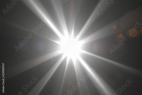 A glowing white light flare Photoshop overlay effect. A realistic, bright light ray soft gradient on a transparent background high-quality effect, photo and videos for editors. luminous shine