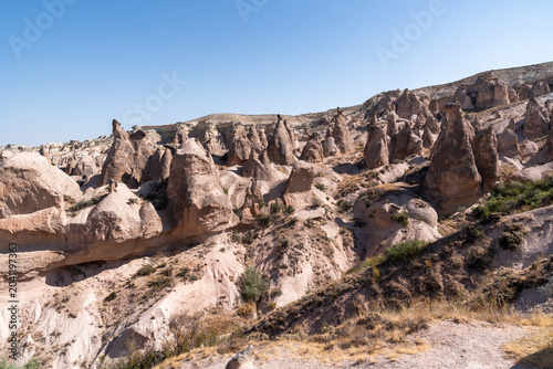 Typical rocky and barren landscape in the Devrent Valley in Cappadocia on a summer day.