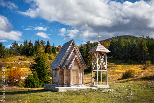 Small wooden orthodox church in the mountains near the town of Drvar in Bosnia and Herzegovina