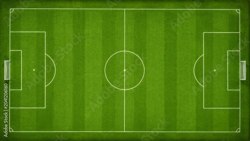 Top-down view of a perfectly maintained green soccer field, ready for a game. The white lines clearly mark the boundaries and center circle, while goalposts stand at each end