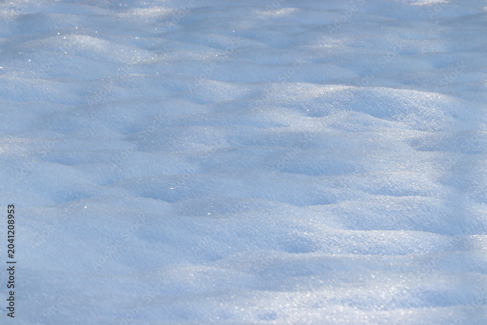 Foto Sparkling snow texture in winter sunlight